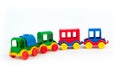 Children\'s toy, a multi-colored steam locomotive on a white background Royalty Free Stock Photo