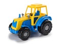 Children`s toy tractor on a white.