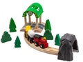 Wooden toy set with train, tracks and trees with tunnel for children\'s play.