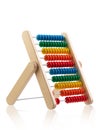 Children`s toy wooden abacus with multicolored knuckles, isolated on a white background Royalty Free Stock Photo