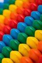 Children`s toy wooden abacus with multicolored knuckles, isolated on a white background Royalty Free Stock Photo