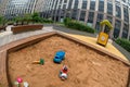 Children`s toys at the new modern green courtyard Royalty Free Stock Photo