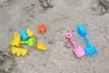 Children`s Toys on sand beach background Royalty Free Stock Photo