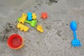 Children`s Toys on sand beach background Royalty Free Stock Photo