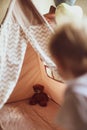 Children`s wigwam for a beige boy. In the nursery. Royalty Free Stock Photo