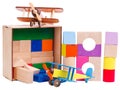Children`s wooden, geometric shapes, stacked on top of each other, with a model airplane, isolated on white background. Royalty Free Stock Photo