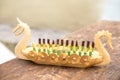 Children`s wooden toy with metal rivets, model of the Viking boat drakkar Royalty Free Stock Photo