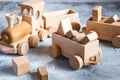 Children`s wooden toys. Children wooden  train with wagons. Natural wood construction set. Educational equipment Royalty Free Stock Photo