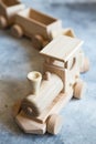 Children`s wooden toys. Children wooden train with wagons. Natural wood construction set. Educational equipment. Children`s wood Royalty Free Stock Photo