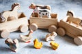 Children`s wooden toys. Children wooden train with wagons. Natural wood construction set. Educational equipment