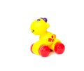 Children`s yellow toy giraffe on a white background, isolate