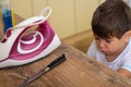 Children safety. Dangerous in the kitchen. Kitchen knife put on table. Selective focus Royalty Free Stock Photo