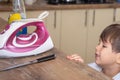 Children safety. Dangerous in the kitchen. Kitchen knife put on table. Selective focus Royalty Free Stock Photo