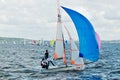 Children sailing racing dinghies at championships. April 17, 2