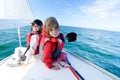 Children Sailing On Yacht