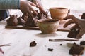 Children sculpt a figurine of a cat out of clay Royalty Free Stock Photo