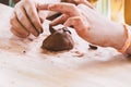 Children sculpt a figurine of a cat out of clay Royalty Free Stock Photo