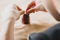 Children sculpt a figurine of a cat out of clay Royalty Free Stock Photo