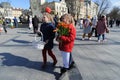 Ukrainian children sell flowers during their action called `Buy flowers and support our defenders` in Lviv