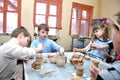 Children shaping clay in pottery studio Royalty Free Stock Photo