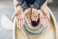 Children showing their hands after working on the potters wheel Royalty Free Stock Photo