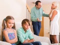 Children in silence while parents arguing