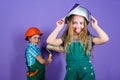 Children sisters run renovation their room. Sisters happy renovating home. Home improvement activities. Renovation team Royalty Free Stock Photo