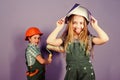 Children sisters run renovation their room. Sisters happy renovating home. Home improvement activities. Renovation team Royalty Free Stock Photo