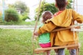 Older brother hugging little sister Royalty Free Stock Photo