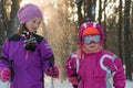 Children skiing in the forest winter snow kids walk in the Park