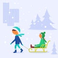 Children sledding. . A boy takes a girl on a sled in winte