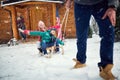 Children sledding at winter time Royalty Free Stock Photo