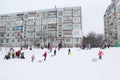 Children are sleding from the hill