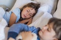Children sleeping in bed Royalty Free Stock Photo