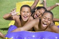 Children sliding on water