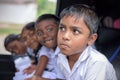 Children smiling on the car before go to school and looking at camera