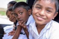 Children smiling on the car before go to school and looking at camera