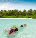 Children snorkeling in sea Royalty Free Stock Photo