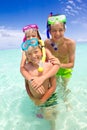 Children with snorkels in sea