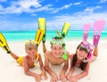 Children with snorkels by sea