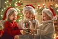 Children with snow globe Royalty Free Stock Photo