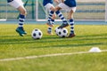 Children with soccer balls on school training field Royalty Free Stock Photo