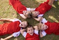 Children, soccer team and portrait with smile, boys and girls with high angle, support or solidarity. Energy, sports and Royalty Free Stock Photo
