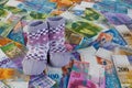 Children socks with Swiss Franc notes