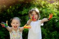 Children soiled with paint and show dirty hands Royalty Free Stock Photo