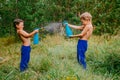 Children splash water on each other Royalty Free Stock Photo