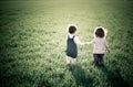 Children in spring field Royalty Free Stock Photo