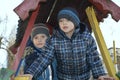 Children in the spring play in the playground.