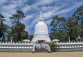 Children on the stairs at white buddhist stupa building located in Nuwara Eliya town Royalty Free Stock Photo