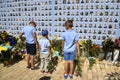 Children stand near Memory Wall of the Fallen Defenders of Ukraine in war in Eastern Ukraine 2014-2020. Kyiv, Ukraine